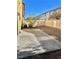 Small backyard with concrete patio and gravel landscaping at 5455 Hasley Canyon Ave, Las Vegas, NV 89139