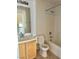 Clean bathroom with a tub, toilet and vanity at 5455 Hasley Canyon Ave, Las Vegas, NV 89139