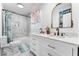 Bathroom with double vanity and hexagon tile at 664 Spring Rd, Indian Springs, NV 89018