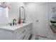 Double vanity bathroom with white cabinets at 664 Spring Rd, Indian Springs, NV 89018