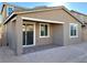 Brick patio and large backyard at 9922 Angel Valley Dr, Las Vegas, NV 89178