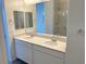 Double vanity bathroom with modern fixtures and a large walk-in shower at 9922 Angel Valley Dr, Las Vegas, NV 89178