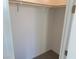 Empty closet with wood hanging rod at 9922 Angel Valley Dr, Las Vegas, NV 89178