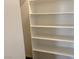 Built-in white shelves for pantry storage at 9922 Angel Valley Dr, Las Vegas, NV 89178