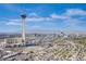 Expansive aerial view showcasing the city skyline and the Stratosphere tower on a clear day at 222 Karen Ave # 3907, Las Vegas, NV 89109