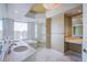 This bathroom features dual sinks, vanity area, bathtub, and walk-in shower at 222 Karen Ave # 3907, Las Vegas, NV 89109