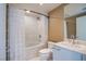 Bright bathroom features a shower-over-tub, white vanity, and neutral tiling at 222 Karen Ave # 3907, Las Vegas, NV 89109