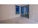 This bedroom features tile flooring and an outside view at 222 Karen Ave # 3907, Las Vegas, NV 89109