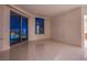 This bedroom features tile flooring and an amazing city view at 222 Karen Ave # 3907, Las Vegas, NV 89109