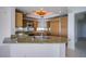 Modern kitchen features granite countertops, stainless steel appliances, and ample cabinet space at 222 Karen Ave # 3907, Las Vegas, NV 89109