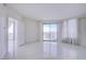 Bright living room features tile flooring, a balcony, and recessed lighting at 222 Karen Ave # 3907, Las Vegas, NV 89109
