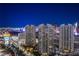 Striking night view of the Las Vegas Strip featuring high-rise condos and vibrant city lights at 222 Karen Ave # 3907, Las Vegas, NV 89109
