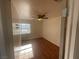 Bright bedroom with wood floors and a ceiling fan at 505 Crony Ave, Henderson, NV 89011