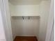 Empty closet with wood floors and a hanging rod at 505 Crony Ave, Henderson, NV 89011