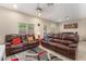 Spacious living area featuring dual leather sofas, neutral walls, and modern decor at 6837 Dragonfly Rock St, Las Vegas, NV 89148