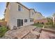 Private backyard with brick patio and landscaping at 10414 White Princess Ave, Las Vegas, NV 89166