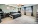 Large main bedroom with carpeted floors, and plenty of natural light at 10414 White Princess Ave, Las Vegas, NV 89166