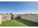 Private rooftop deck with artificial turf and city views at 10414 White Princess Ave, Las Vegas, NV 89166