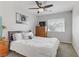 Bedroom with double bed, dresser, and ceiling fan at 11009 Pentland Downs St, Las Vegas, NV 89141