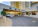 Elegant building entrance with covered valet and parking at 125 E Harmon Ave # 3716, Las Vegas, NV 89109