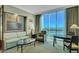 Living room with city views and comfortable seating at 125 E Harmon Ave # 3716, Las Vegas, NV 89109