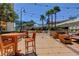 Outdoor patio with seating and string lights at 125 E Harmon Ave # 3716, Las Vegas, NV 89109