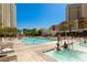 Relaxing pool and spa area with ample seating at 125 E Harmon Ave # 3716, Las Vegas, NV 89109