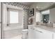 Clean bathroom with soaking tub, modern vanity, and patterned tile at 222 Karen Ave # 401, Las Vegas, NV 89109