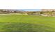 Expansive green golf course with mountain backdrop at 5 Moonfire Dr, Las Vegas, NV 89135