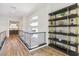 Modern hallway with stylish shelving and metal railing at 5 Moonfire Dr, Las Vegas, NV 89135