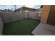 Small, private backyard with artificial turf at 6311 W Washington Ave, Las Vegas, NV 89107