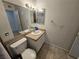 Bathroom with granite vanity, tiled floors and shower/tub combo at 6311 W Washington Ave, Las Vegas, NV 89107