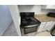 Stainless steel stove and oven in galley kitchen at 6311 W Washington Ave, Las Vegas, NV 89107