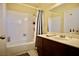 Bathroom with bathtub, shower, and vanity at 7393 Puritan Ave, Las Vegas, NV 89123