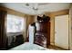 Spacious bedroom with ceiling fan and ample closet space at 7393 Puritan Ave, Las Vegas, NV 89123