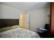 Bedroom with double bed, access to bathroom, and window at 7393 Puritan Ave, Las Vegas, NV 89123