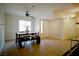 Bright dining area with table and chairs,tile floors, and large window at 7393 Puritan Ave, Las Vegas, NV 89123