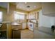 Well-equipped kitchen featuring white appliances and ample counter space at 7393 Puritan Ave, Las Vegas, NV 89123