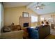 Cozy living room with fireplace and built-in shelving at 7393 Puritan Ave, Las Vegas, NV 89123