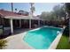 Relaxing kidney-shaped pool perfect for outdoor entertaining at 7393 Puritan Ave, Las Vegas, NV 89123