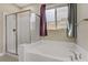 Relaxing bathroom with soaking tub and a separate shower stall at 12270 Monument Hill Ave, Las Vegas, NV 89138