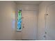 Bright entryway with white door and stained glass at 3367 Villa Fiori Ave, Las Vegas, NV 89141