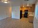 Open floor plan with kitchen and adjacent living area at 3367 Villa Fiori Ave, Las Vegas, NV 89141