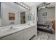 Bathroom with double vanity, and view of bedroom at 3464 Trilogy Dr, Las Vegas, NV 89108