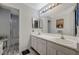 Bright bathroom with double sinks and a separate shower at 3464 Trilogy Dr, Las Vegas, NV 89108