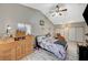 Main bedroom with wood-look floors, ceiling fan, and built-in dresser at 3464 Trilogy Dr, Las Vegas, NV 89108