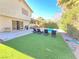 Inviting backyard oasis with a pool and patio at 5882 W Viking Rd, Las Vegas, NV 89103