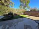 Landscaped backyard with patio and lawn at 5882 W Viking Rd, Las Vegas, NV 89103