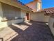 Red front door and a tiled patio area at 5882 W Viking Rd, Las Vegas, NV 89103