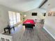 Game room with pool table and hardwood floors at 5882 W Viking Rd, Las Vegas, NV 89103